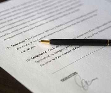 A contract and a pen