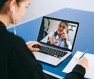 A person having a consultation with her agent.